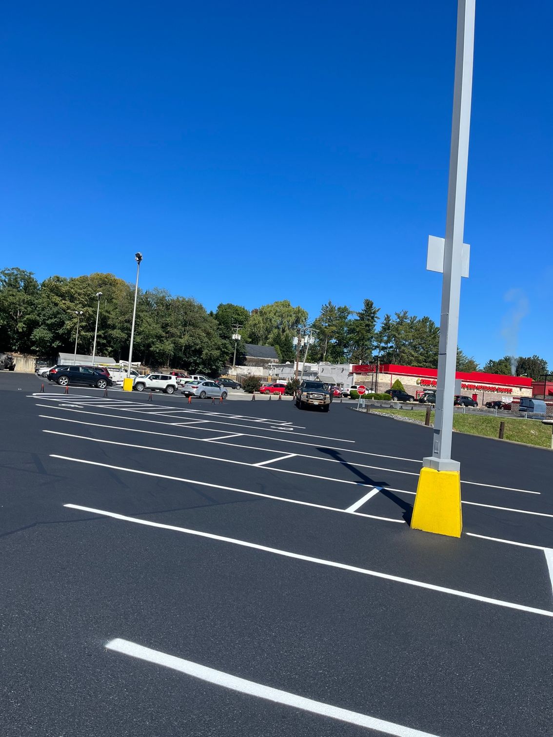 a parking lot with a lot of cars parked in it