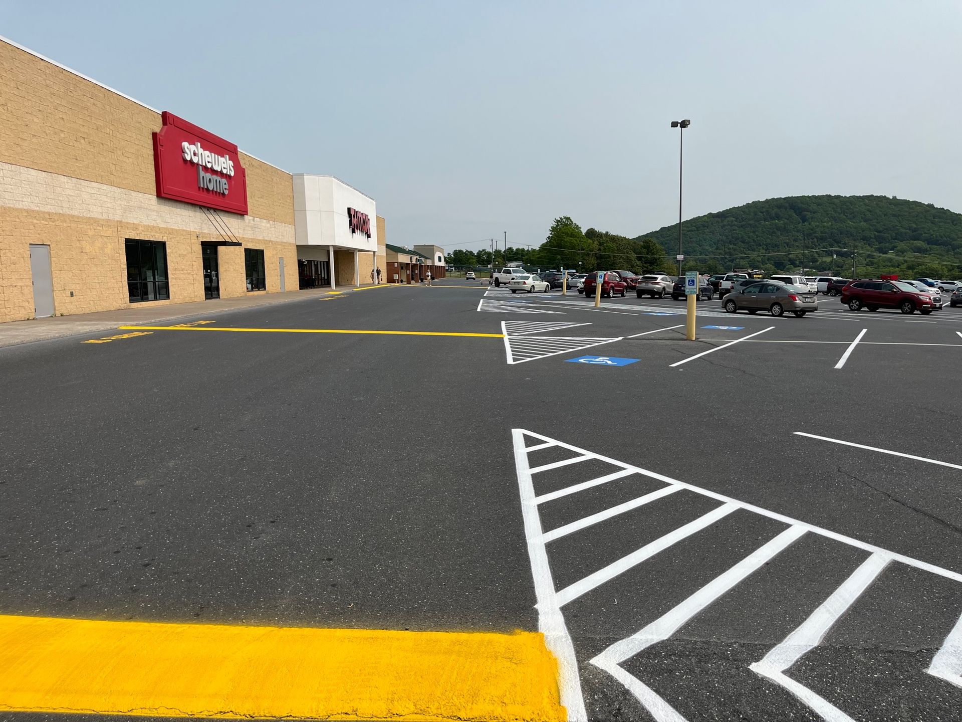 a parking lot in front of a walmart store