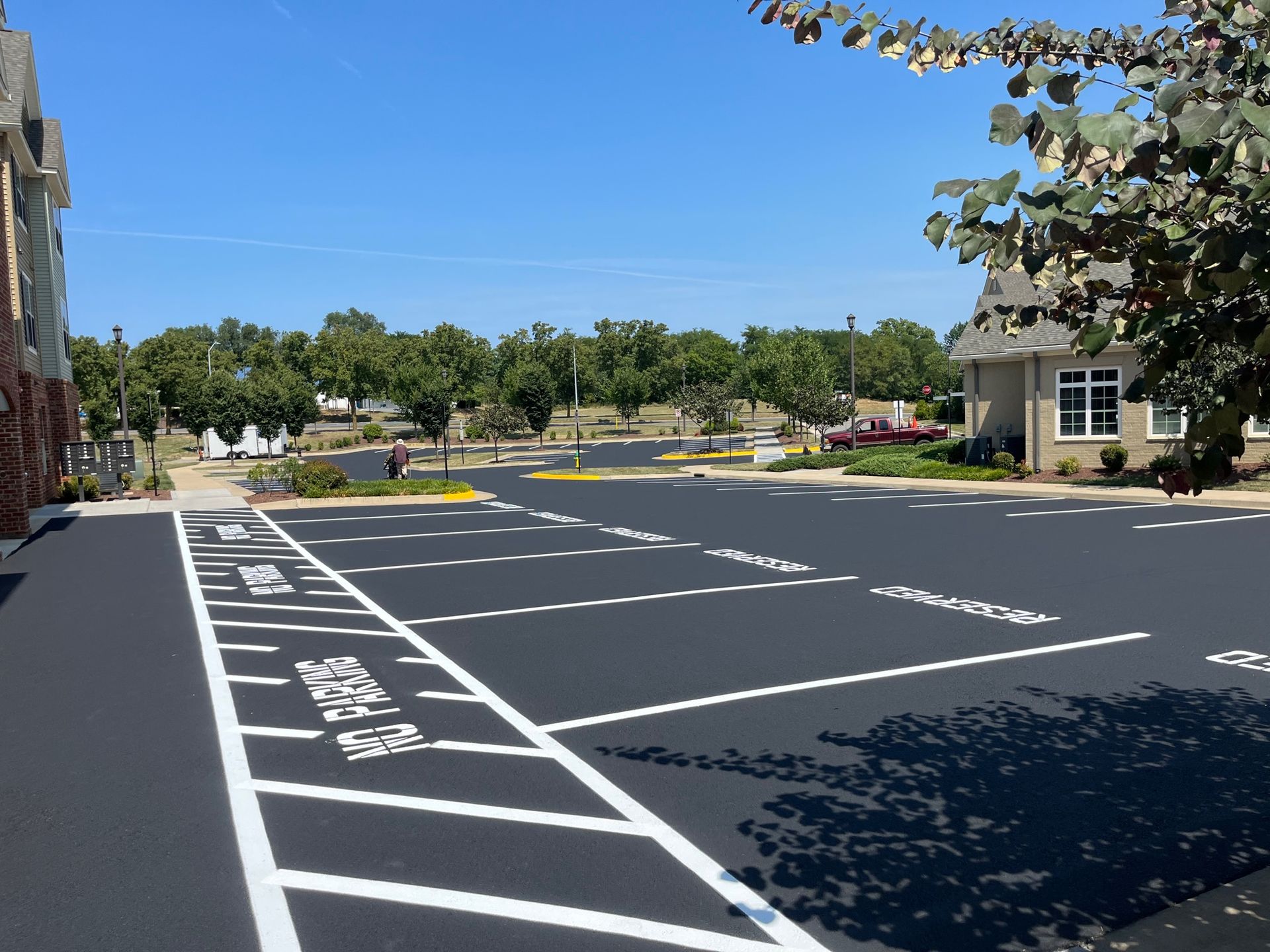 a parking lot with a sign that says no parking