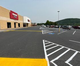 a parking lot in front of a store