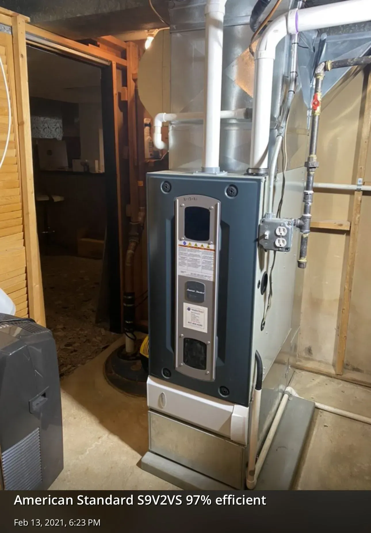 American Standard furnace in a basement setting.