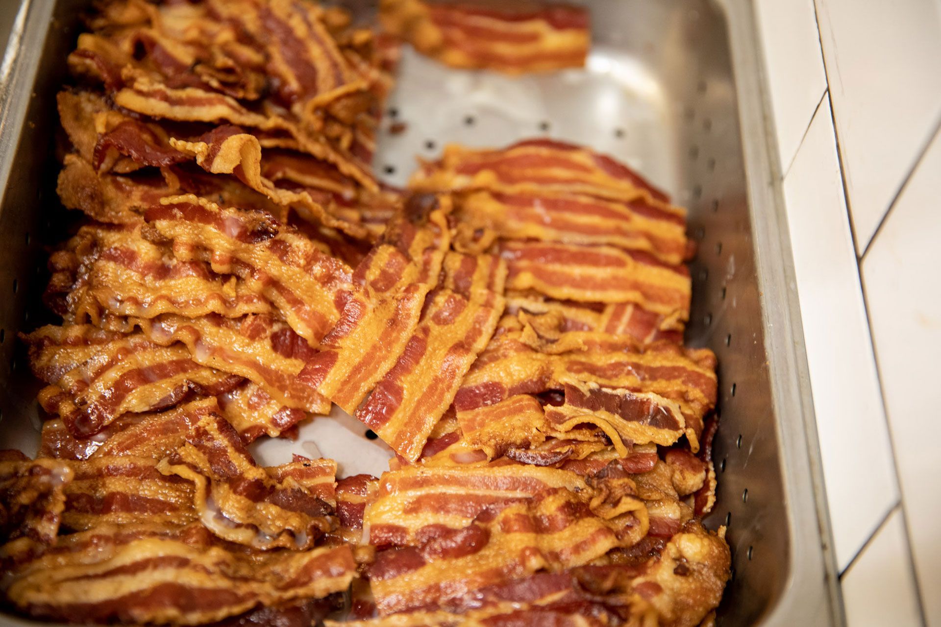 a tray of crispy bacon