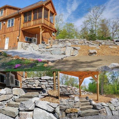 A wooden house with a stone retaining wall and stone steps leading up a tiered landscape with trees under a blue sky.