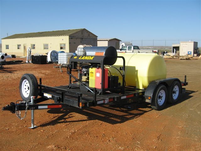 A large yellow tank on a trailer that says lems on it