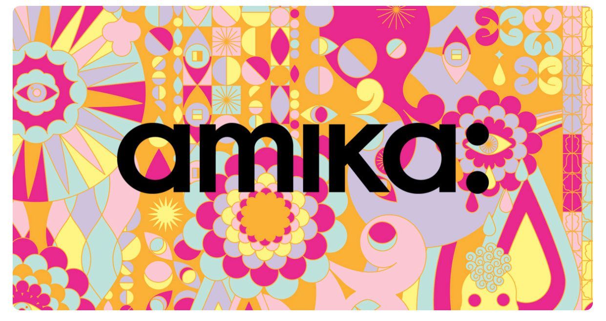 A colorful sign that says amika on it