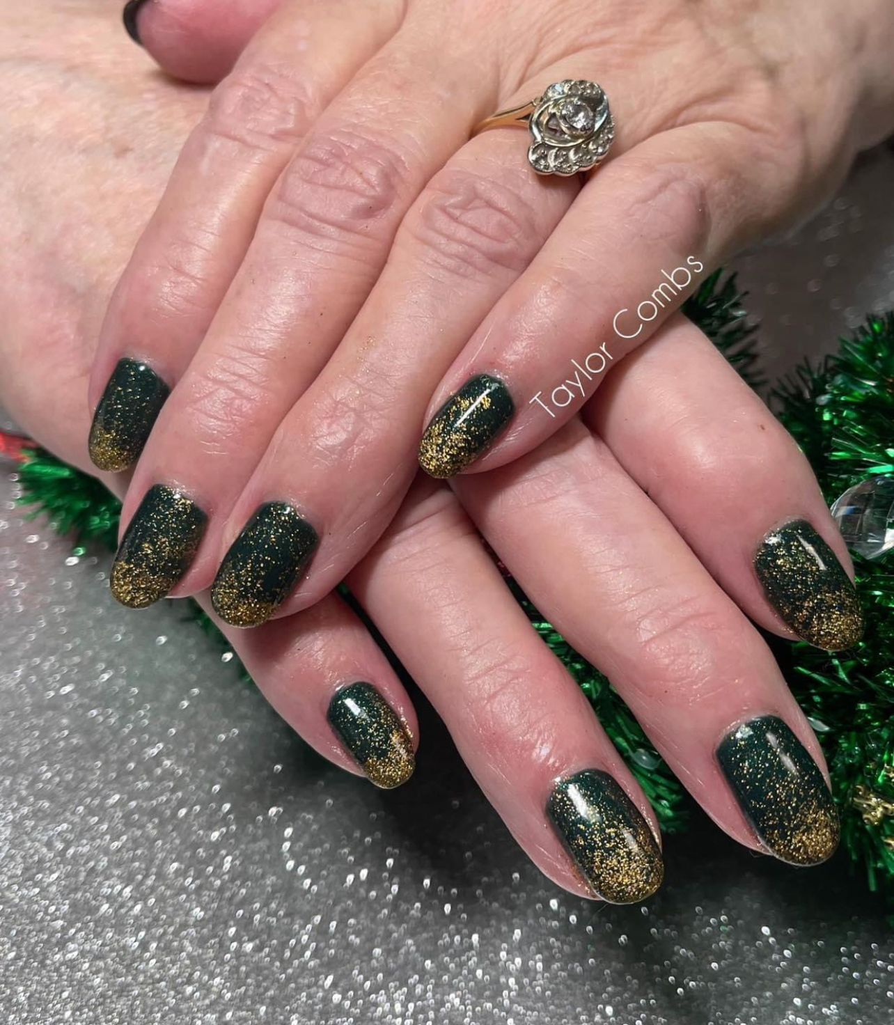 Dark green and gold nails