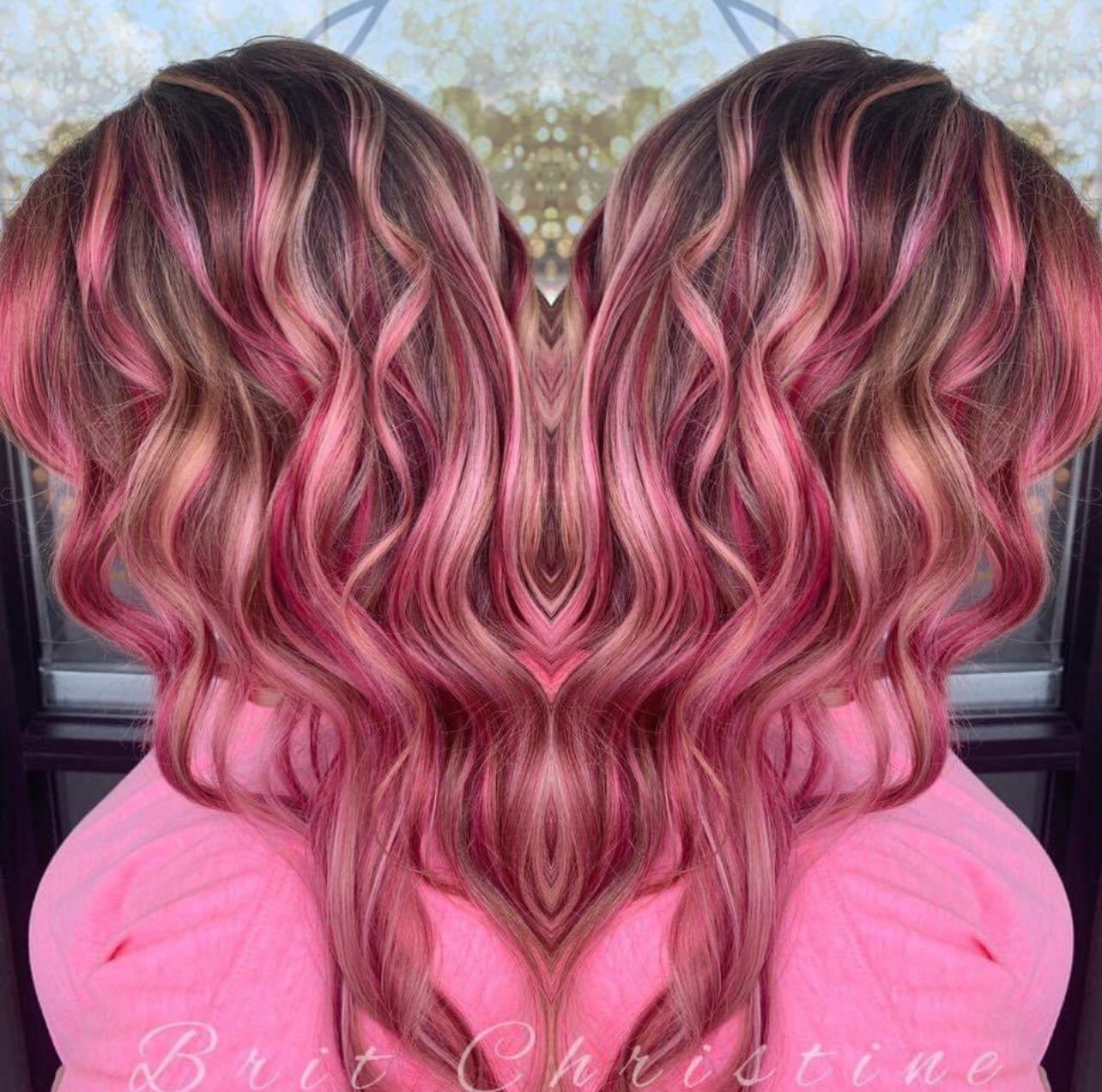 Pink colored and curly hair