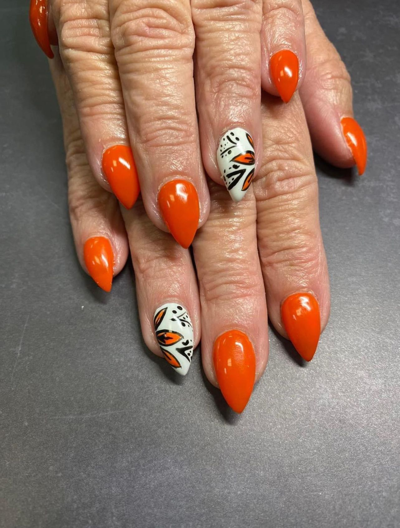 Orange and white nails