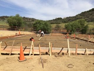 A group of people are working on a construction site.
