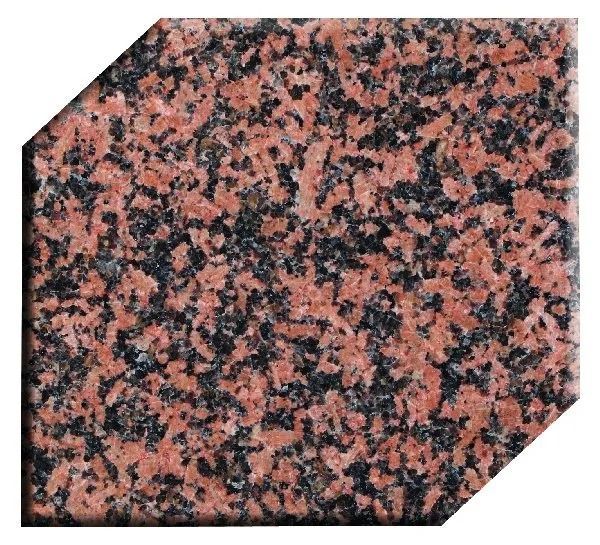 Pink and black speckled granite tile with clipped corners