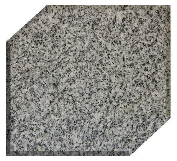 Gray speckled granite tile with clipped corners