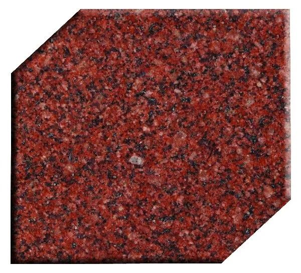 Red speckled granite tile with clipped corners