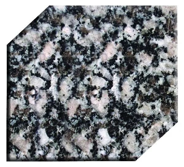 Granite tile with black, white, and pink speckled pattern and angled corners