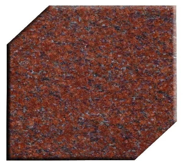 Reddish-brown speckled granite tile with clipped corners