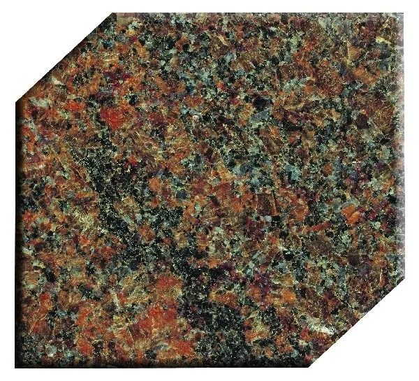 Speckled granite tile with red, black, gray, and gold flecks, cut with clipped corners