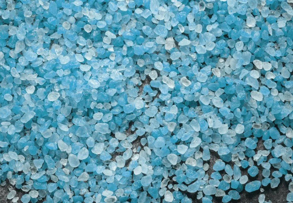 A pile of gravel is sitting on the ground.