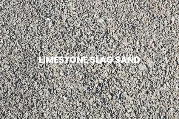 A close up of a pile of limestone slag sand.