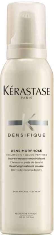 A bottle of Kérastase Densifique mousse on a white background.