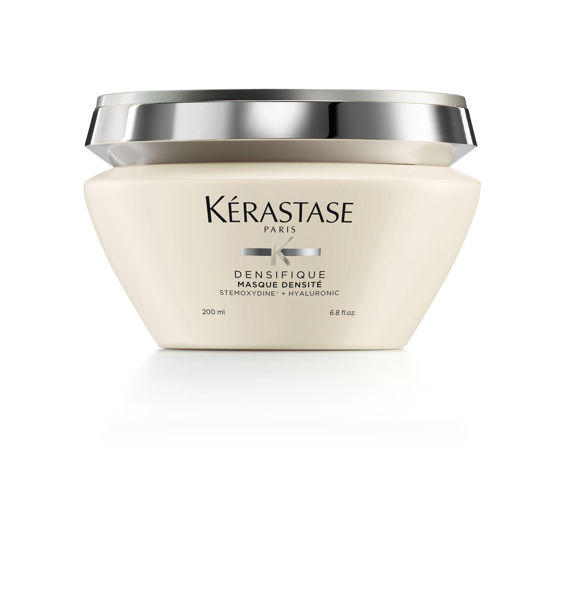 A white jar with the word Kérastase on it