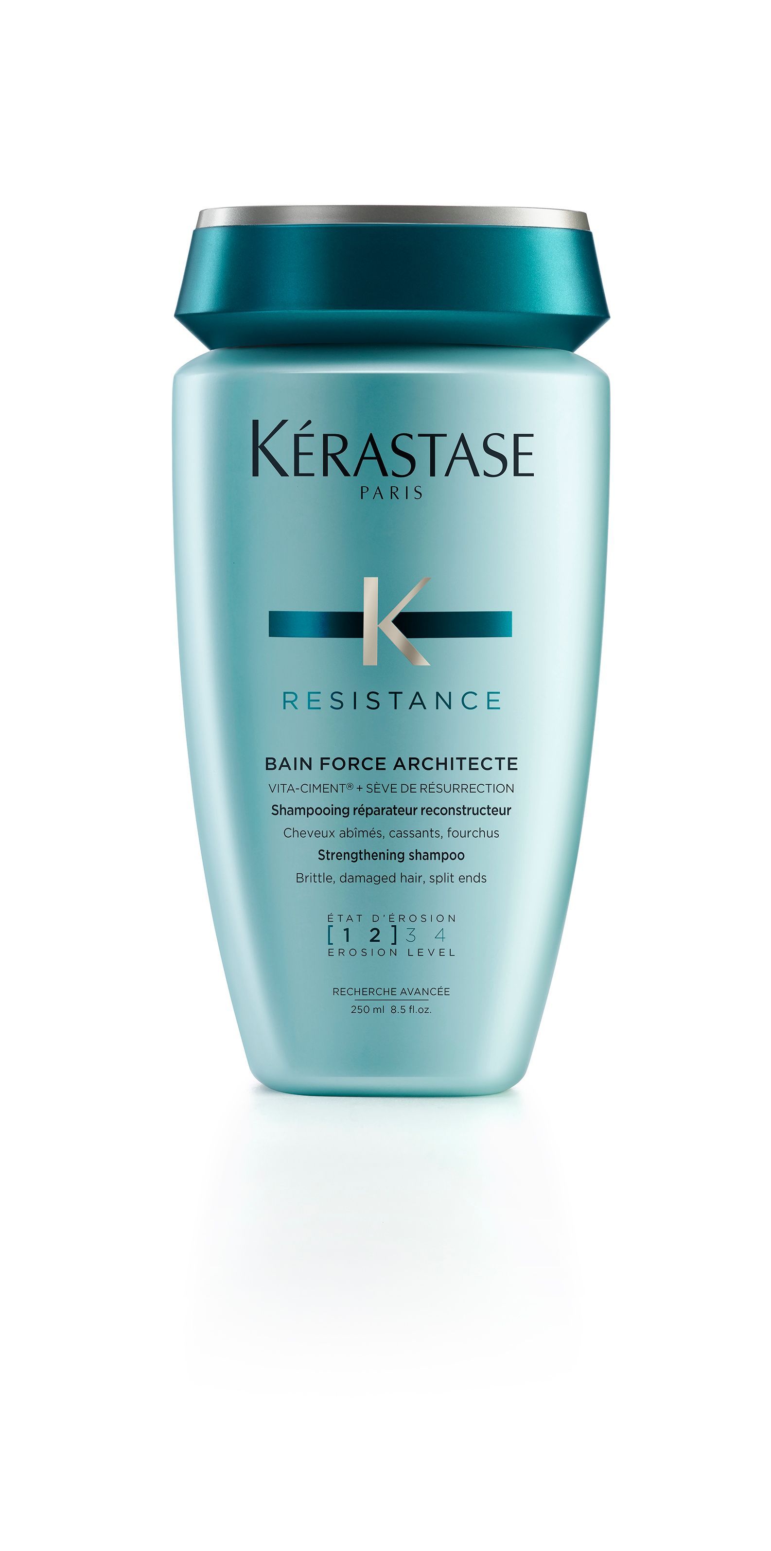 A bottle of Kérastase shampoo on a white background