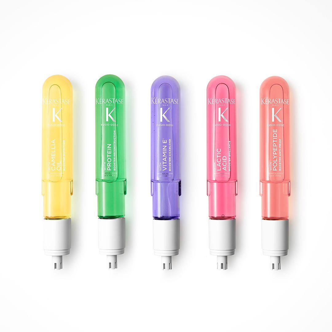 A row of colored pencils with the letter K on them