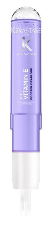 A bottle of Kérastase vitamin e shampoo on a white background.