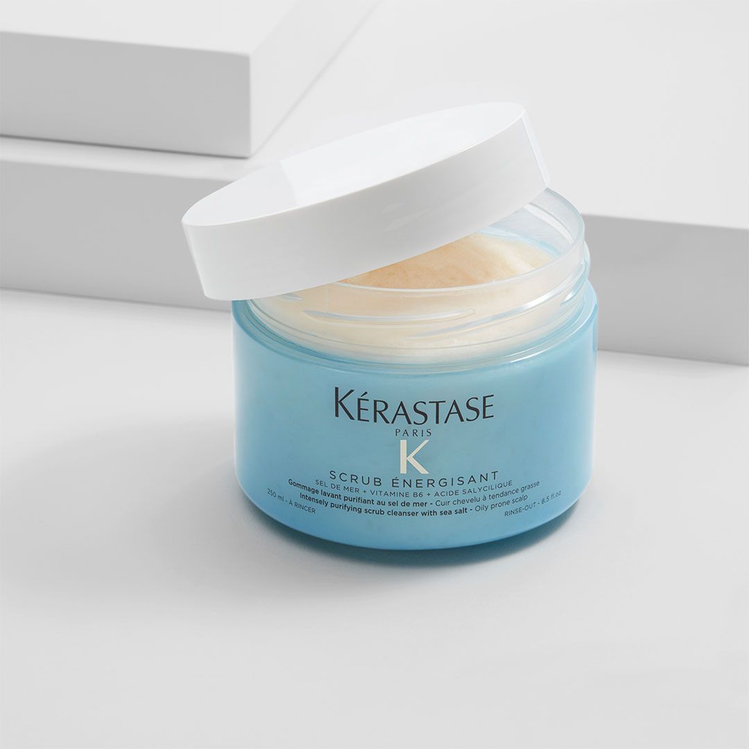 A jar of Kérastase K sitting on a table