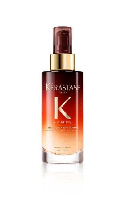 A bottle of Kérastase hair serum on a white background.