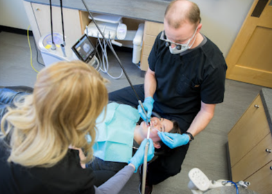 The dentist with patient