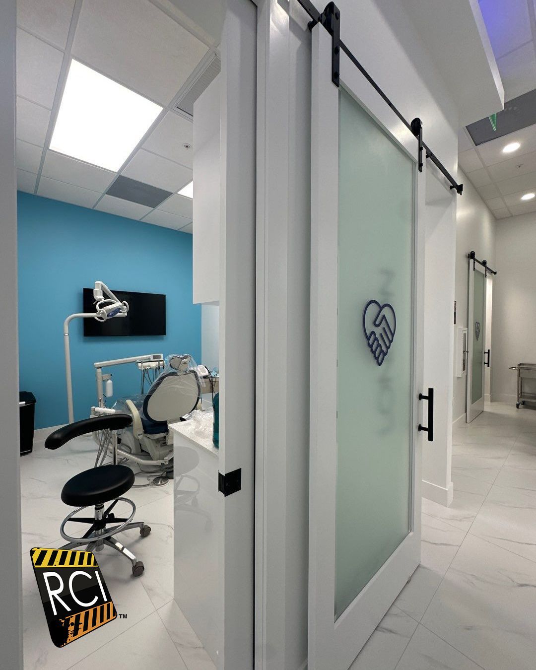 A dental office with a sliding barn door