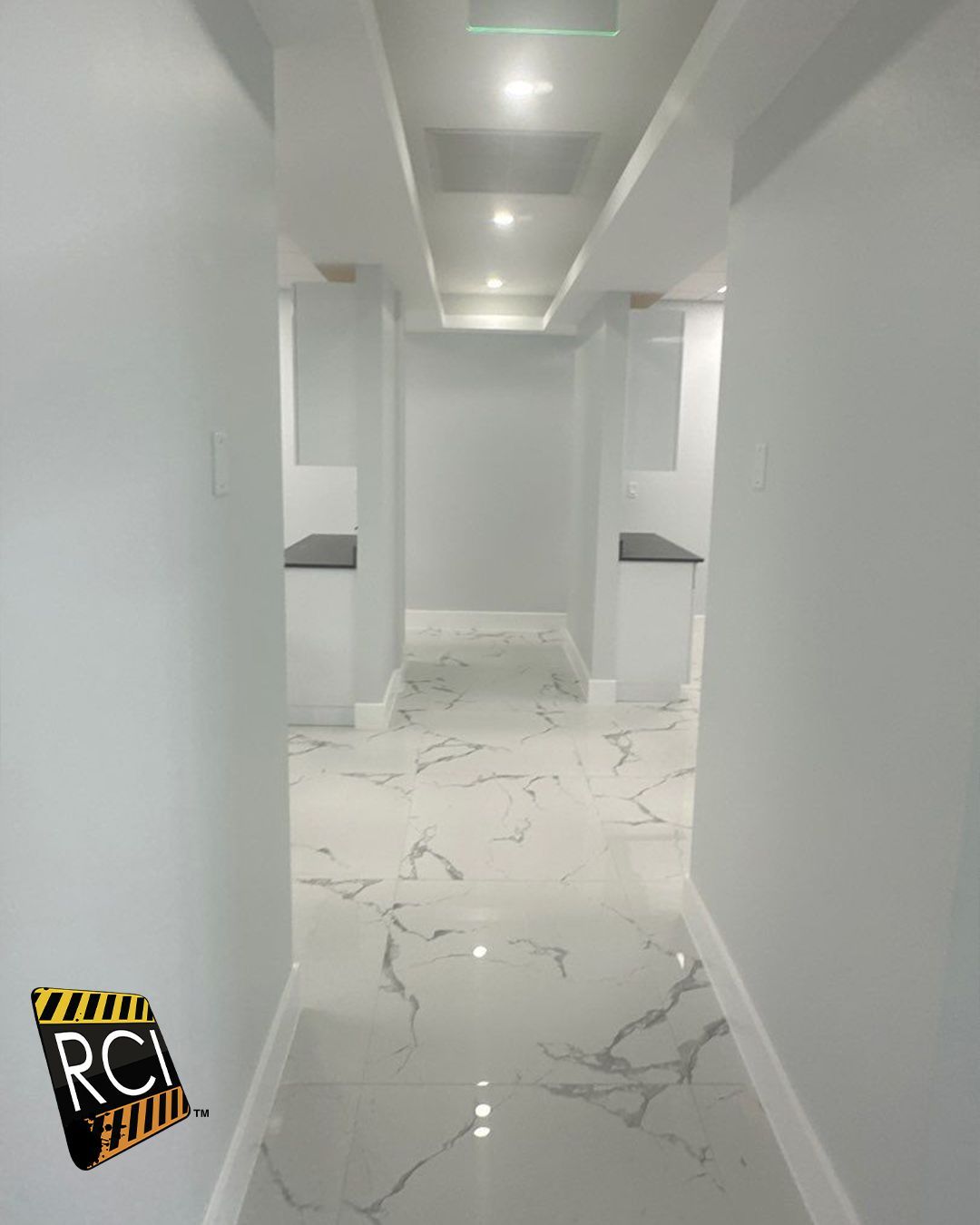 A hallway with a rci logo on the wall