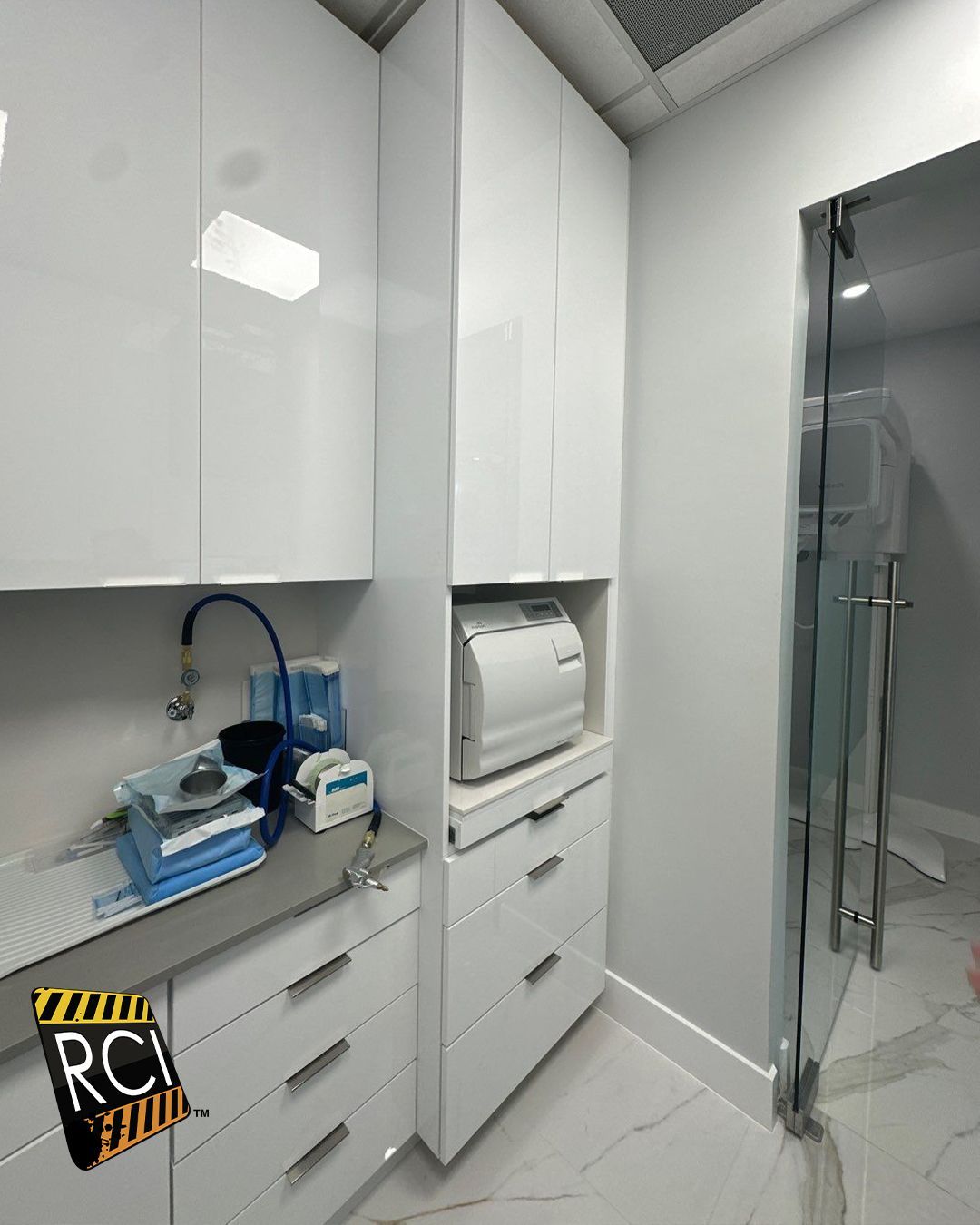 A kitchen with a sign that says rci on it