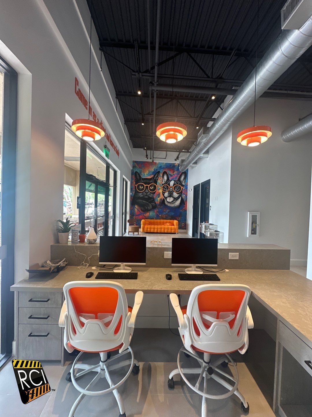 A dental office with a dental chair and a computer.