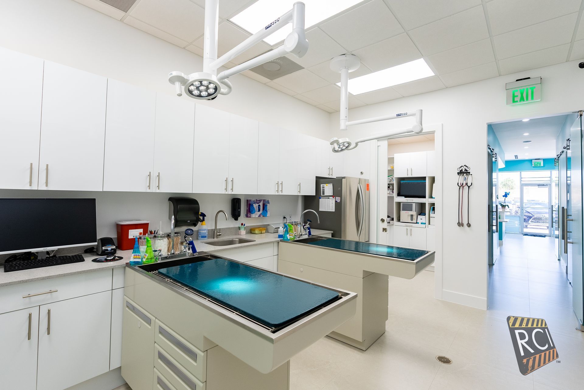 There are two operating tables in the operating room of a veterinary clinic.