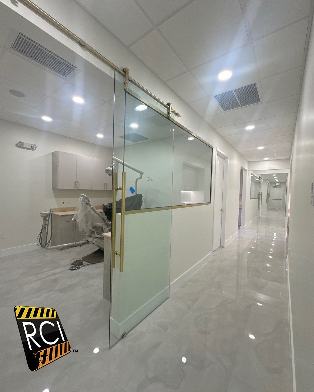A dental office with a sliding glass door