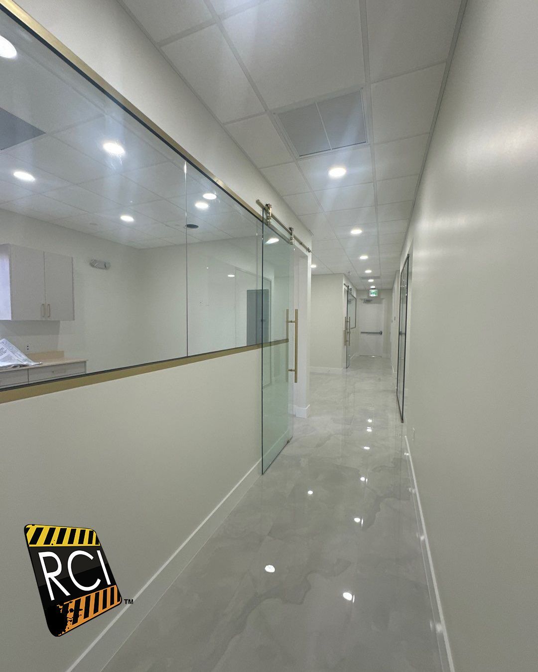 A long hallway with a sign that says rci on it