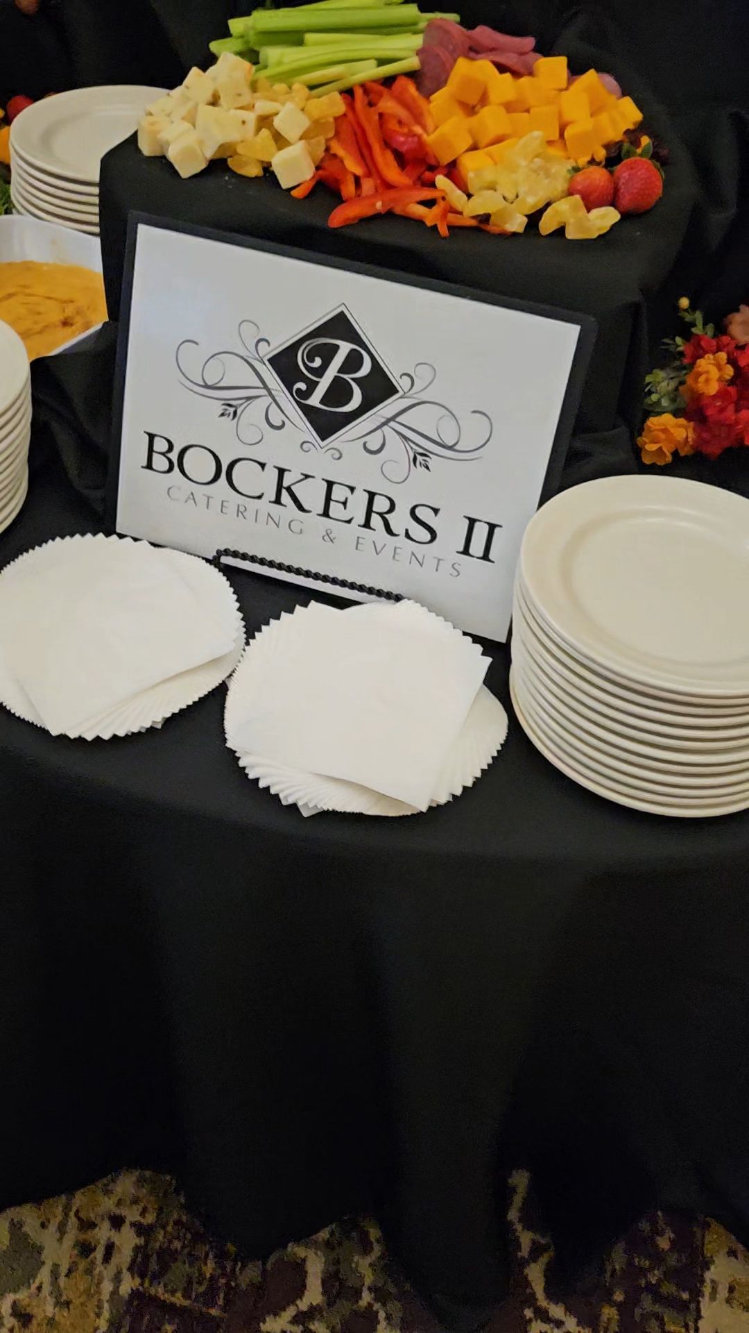 A table with plates and a sign