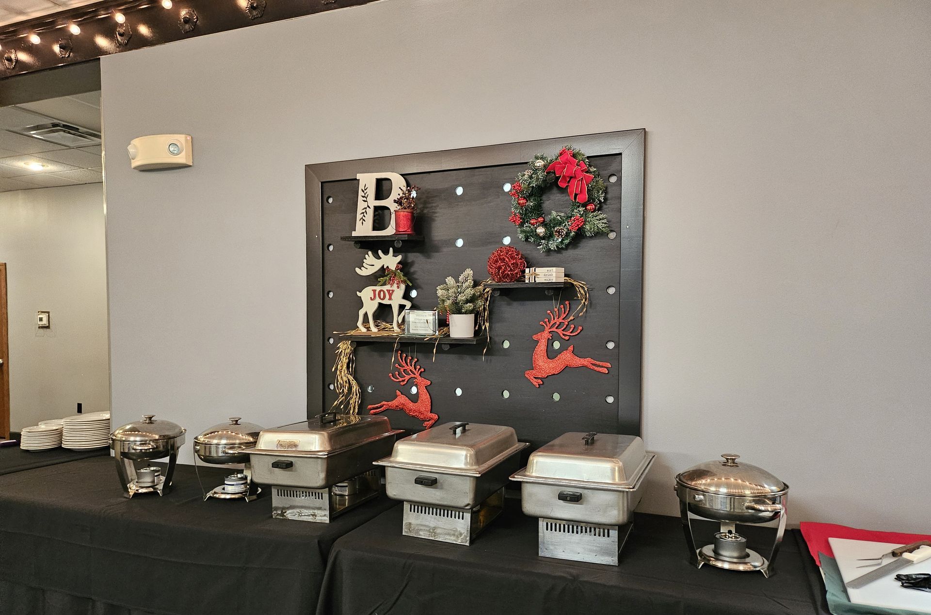 A buffet table with a sign