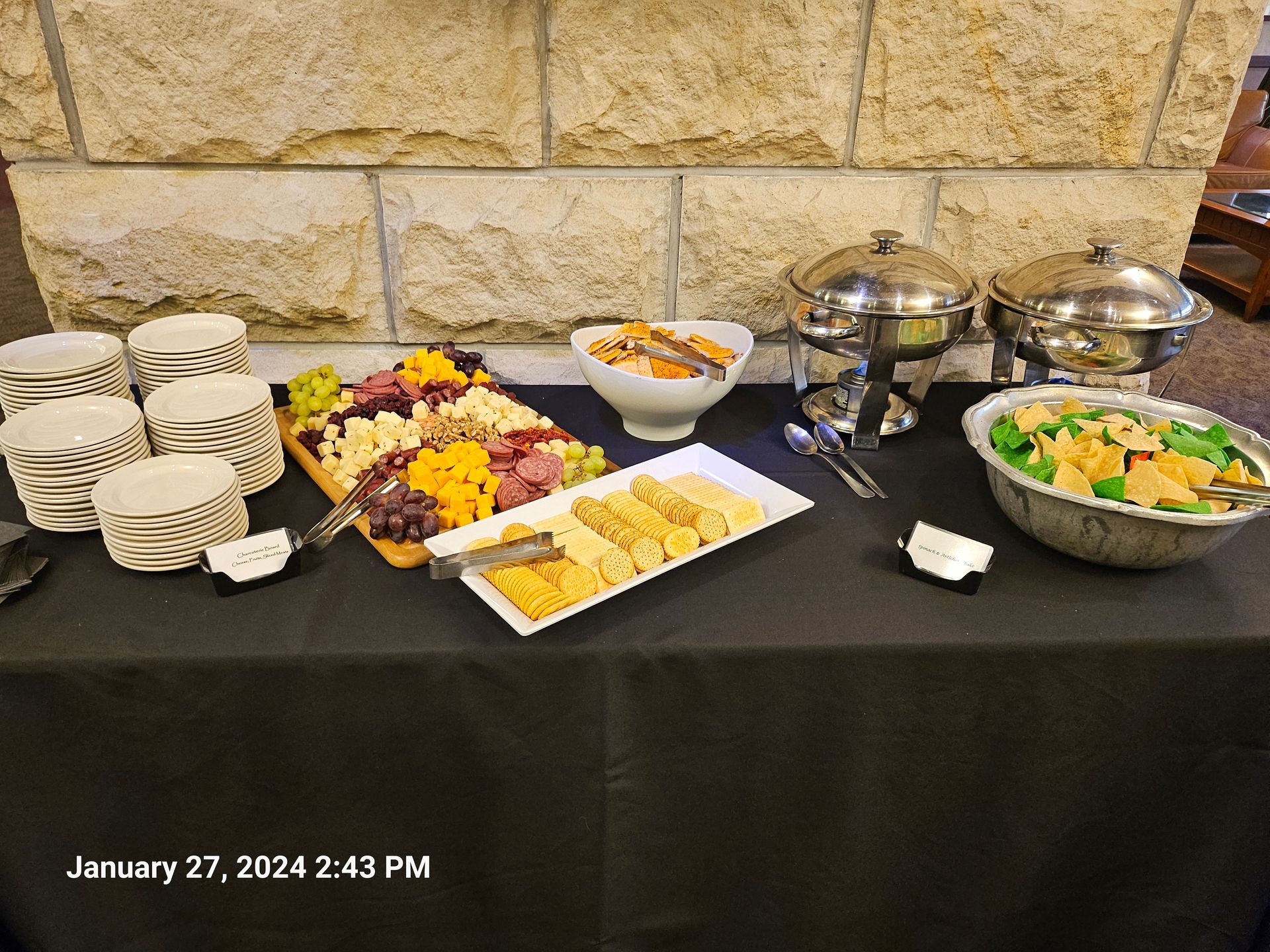 A table with a variety of food on it and the date january 27