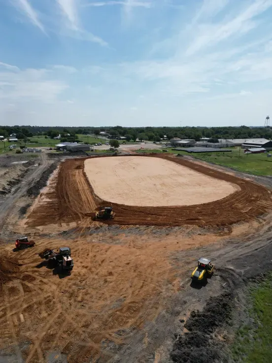 An aerial view of a baseball field being built.