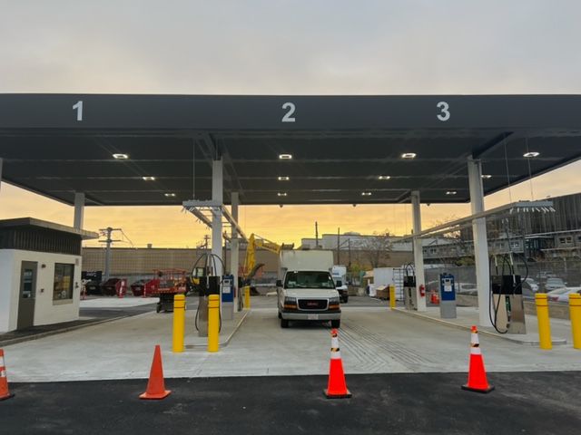A truck at a gas station