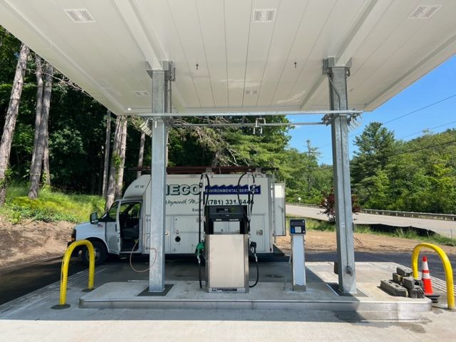 A white truck under a white canopy