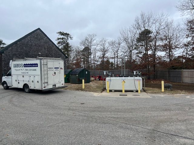 A white trailer parked in a parking lot
