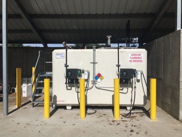 A white container with yellow poles