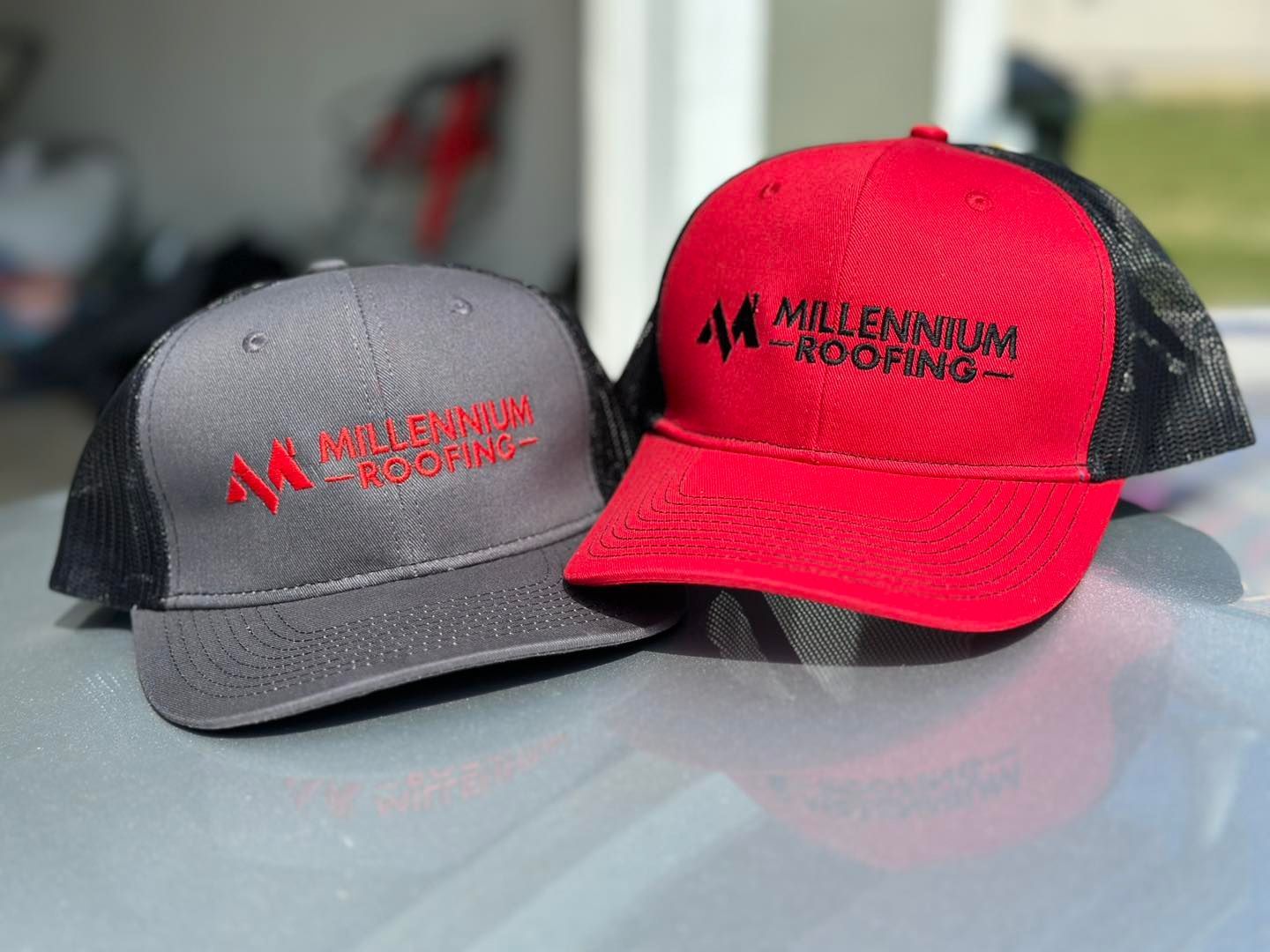 Two baseball caps with