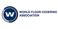 The world floor covering association logo is a blue circle with the letter w in it.