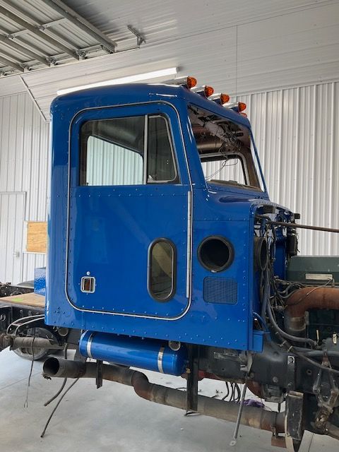 Custom blue paint work being done