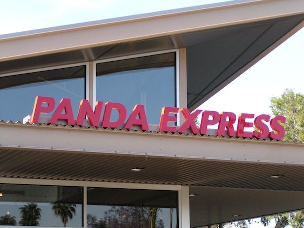 A panda express sign that is outside of a building