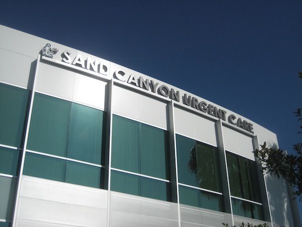 The outside of a building that says sand canyon urgent care