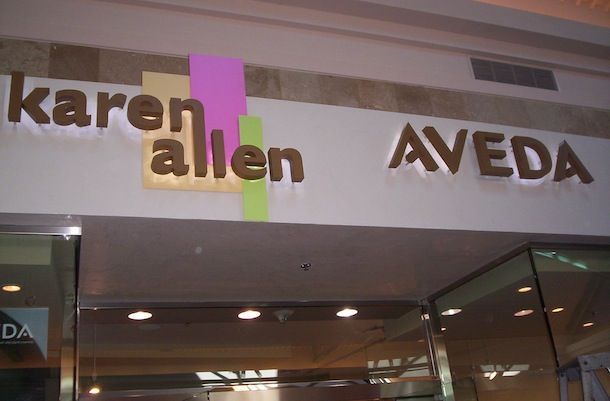 A sign that says karen allen aveda on it